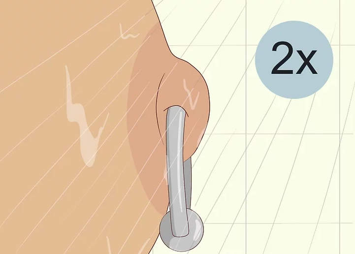 Clean your piercing twice a day