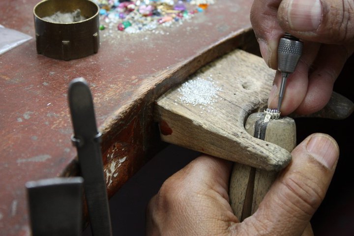 The Diamond Store jewellery preparing a ring for stone setting in his London workshop
