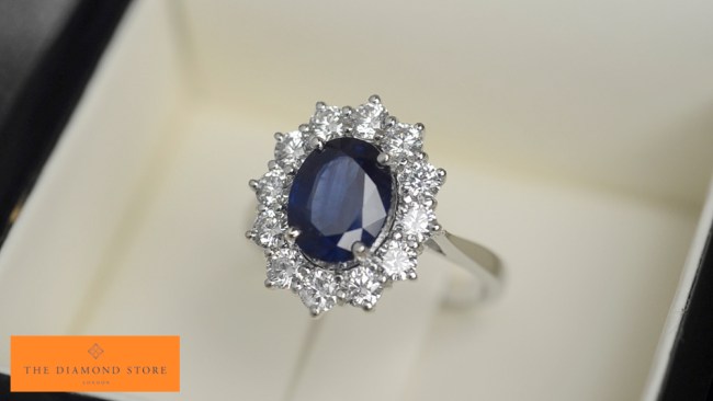 A platinum ring with a large blue sapphire handcrafted by TheDiamondStore.co.uk