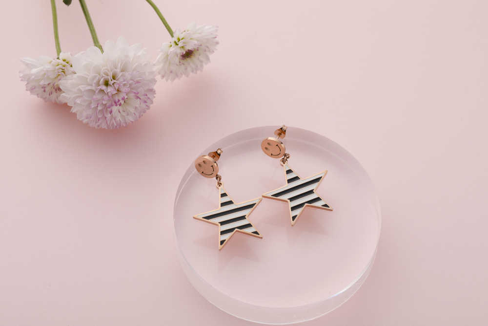 Black and white striped star geometric earrings with Smiling face stud