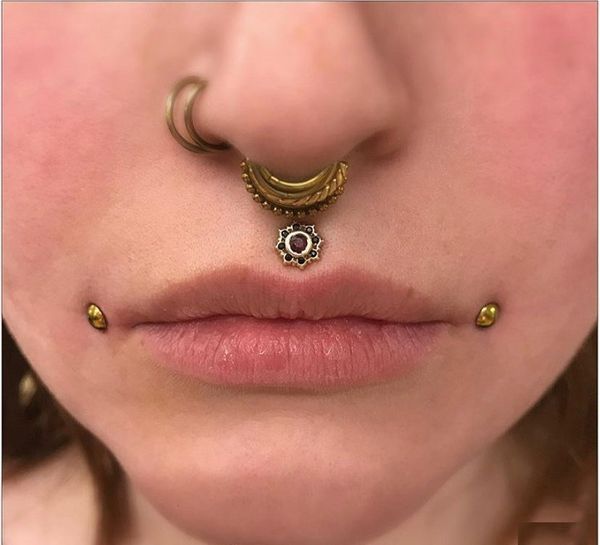 dahlia piercing and septum piercing