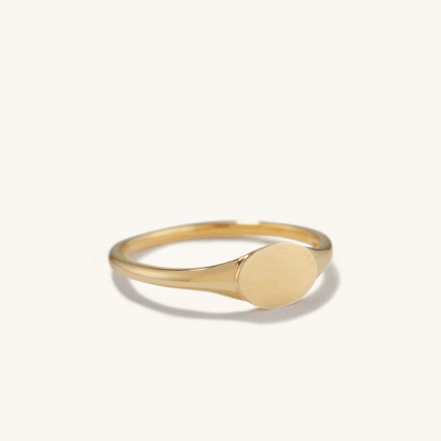 gold signet ring from Mejuri